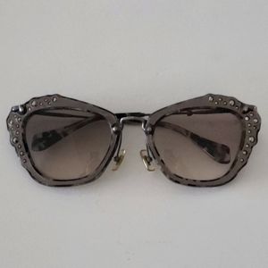 Miu Miu sunglasses with crystal detail